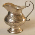 Сливочник старинный серебряный