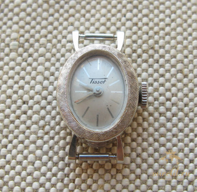 Часы золотые TISSOT