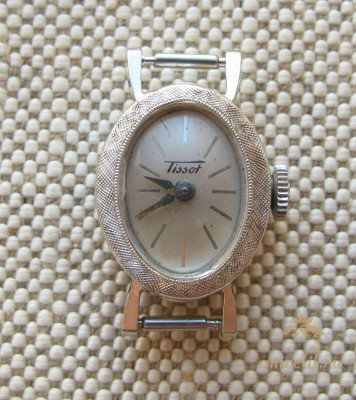 Часы золотые TISSOT