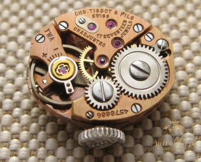 Часы золотые TISSOT