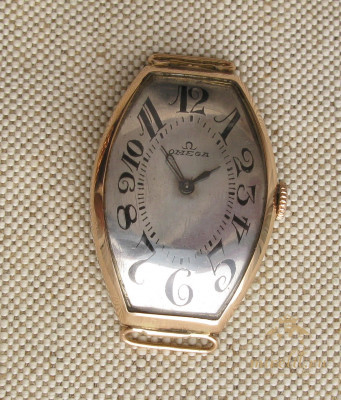 Часы наручные ОМЕГА, OMEGA, золото 551 проба, 1920е годы, 28.5грамм, 45х30мм, сертификат спектрального анализа.
